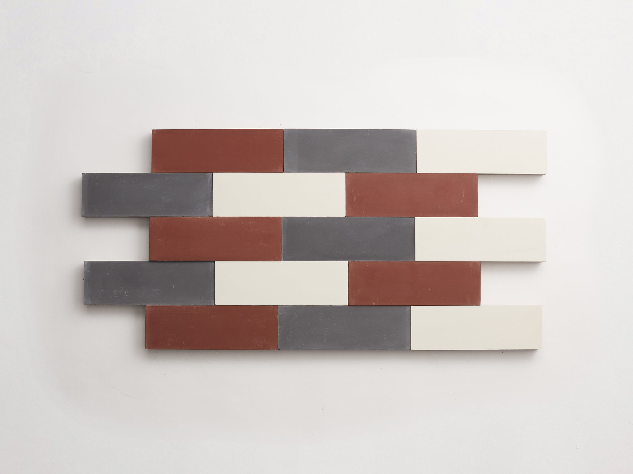 C30161-cle-tile-cement-mythology-salon-2x6-trios-charcoal-paste-chestnut-3000x2250.jpg