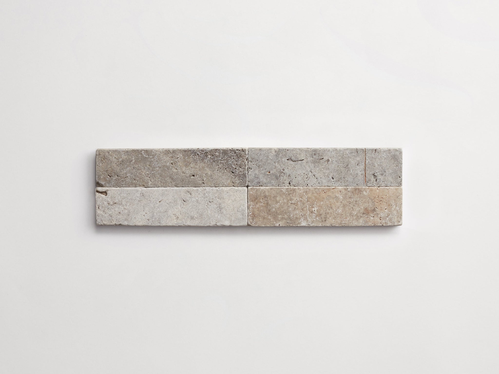 TR2002-shale-cle-tile-travertine-marble-rectangle-2x8-silver-4up-3000x2250-1copy.jpg