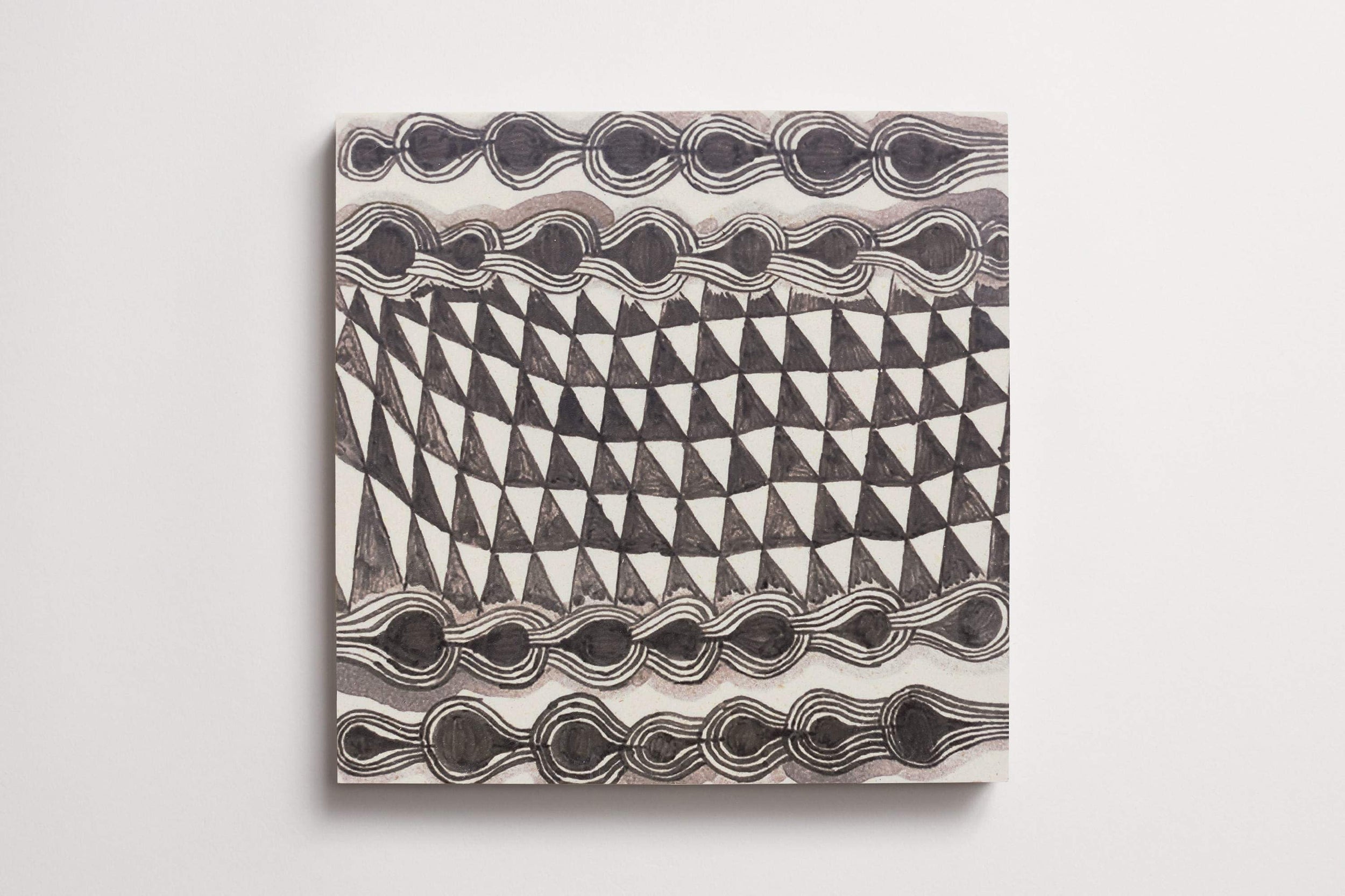 c_l_cle_tile_limestone_ruan_hoffmann_mlm_charcoal_tribal_border_pks_square_12x12_3.0.jpg