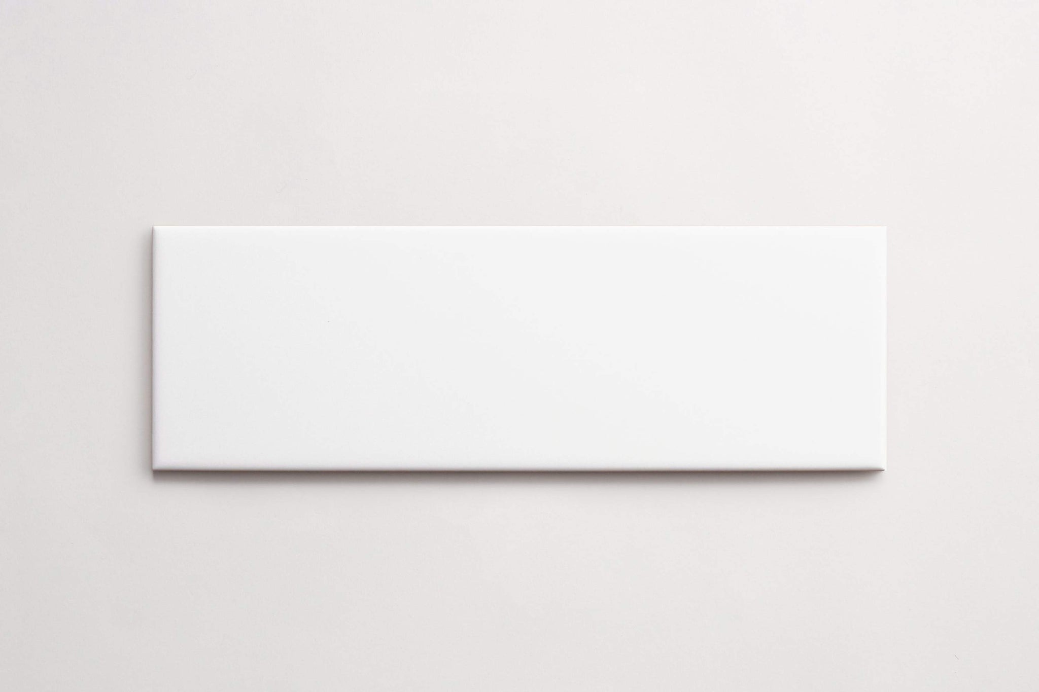 ceramic | white gloss | subway ~ 4"x12"x0.25"