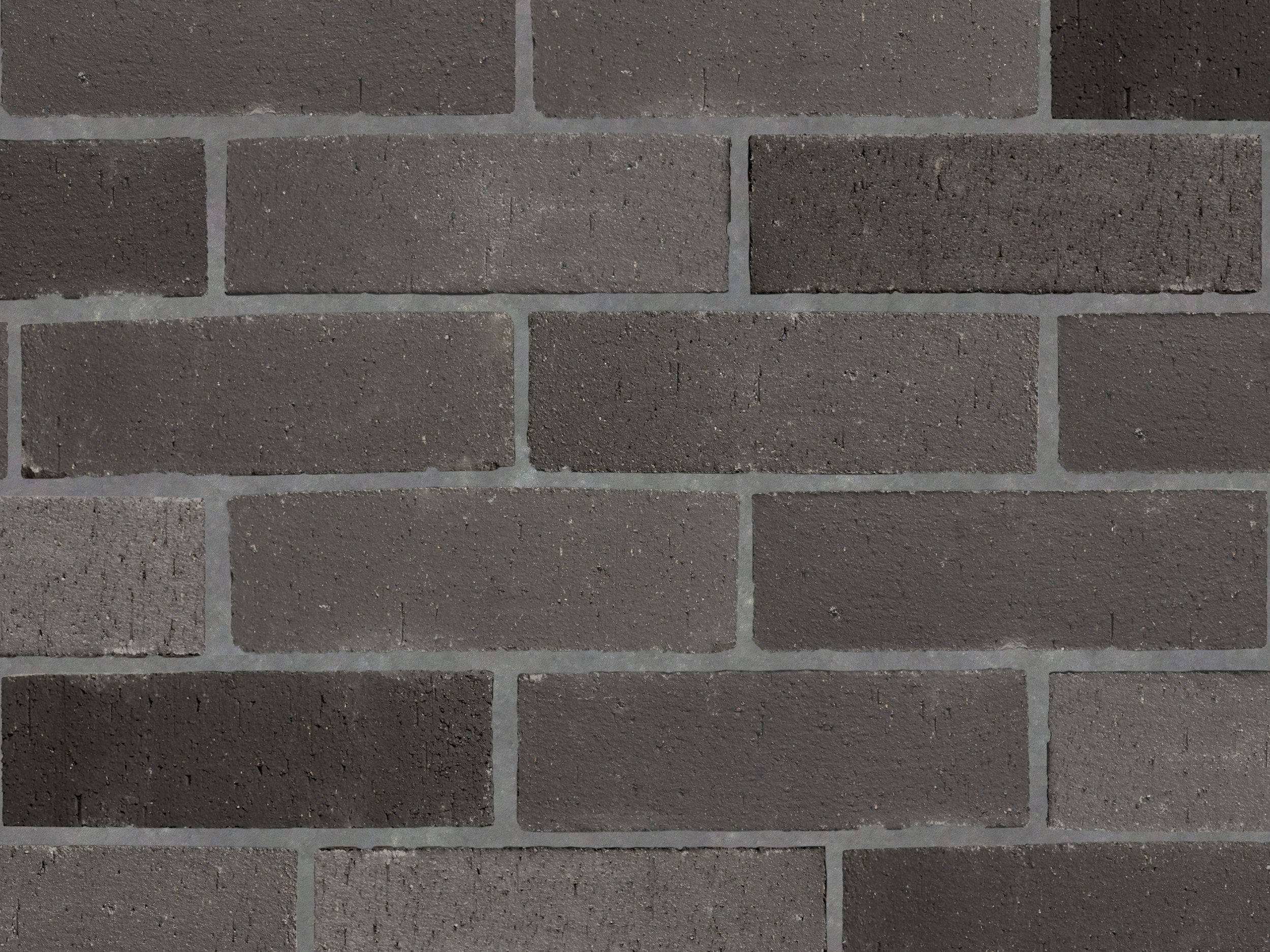 FF10002-cle-tile-brick-foundry-flats-standard-issue-2x8-subway-carbon-8up-wall.jpg