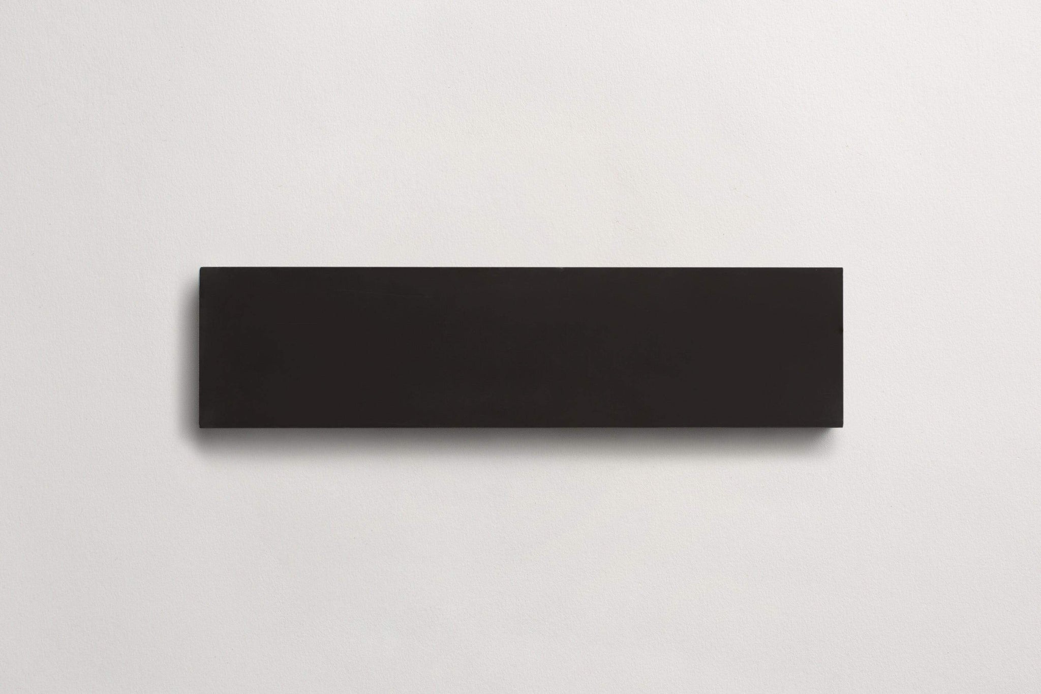 cement | solid | black | rectangle ~ 3"x12"x0.625"