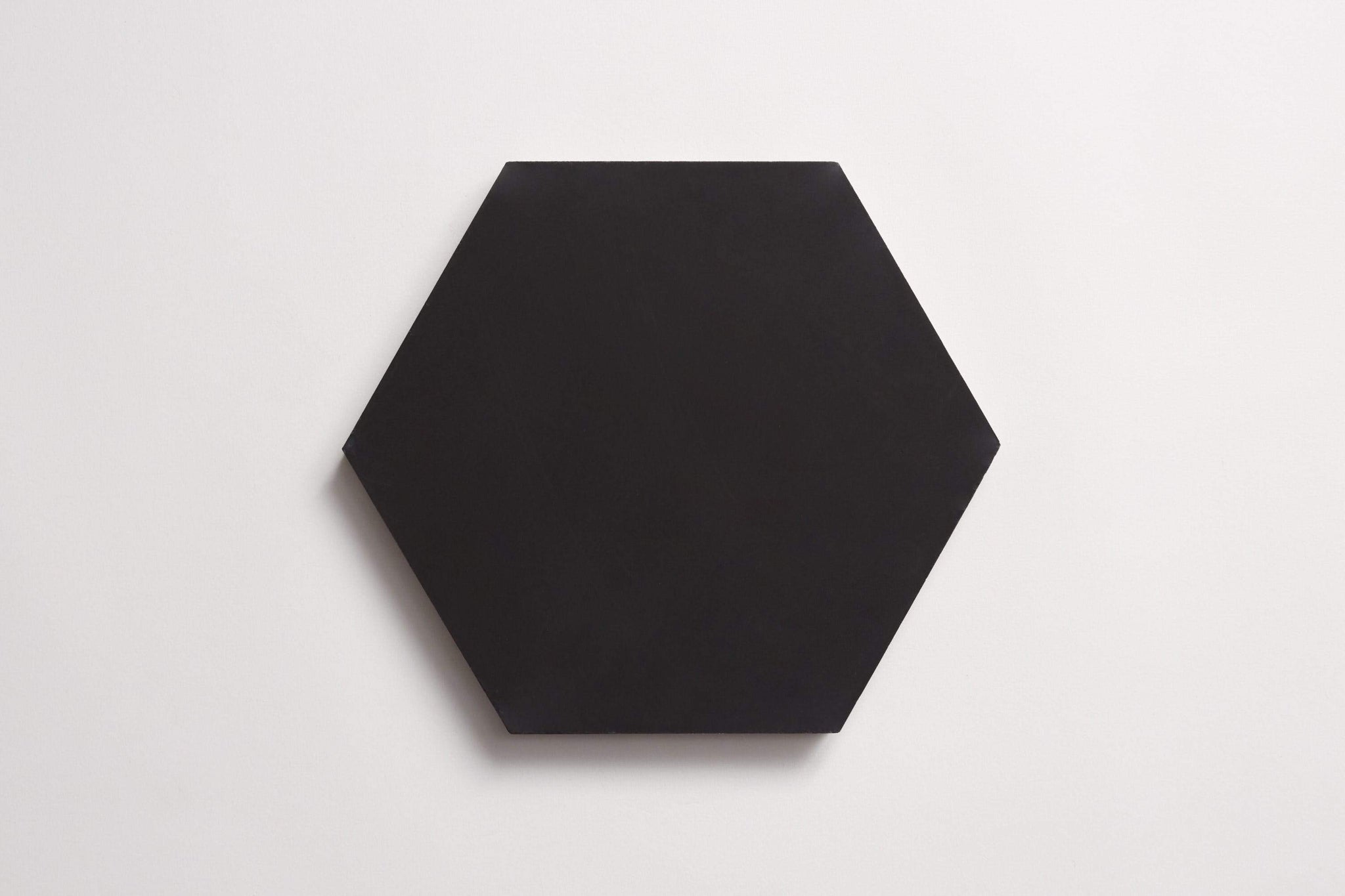 cement | solid | black | hex ~ 9"x8"x0.625"