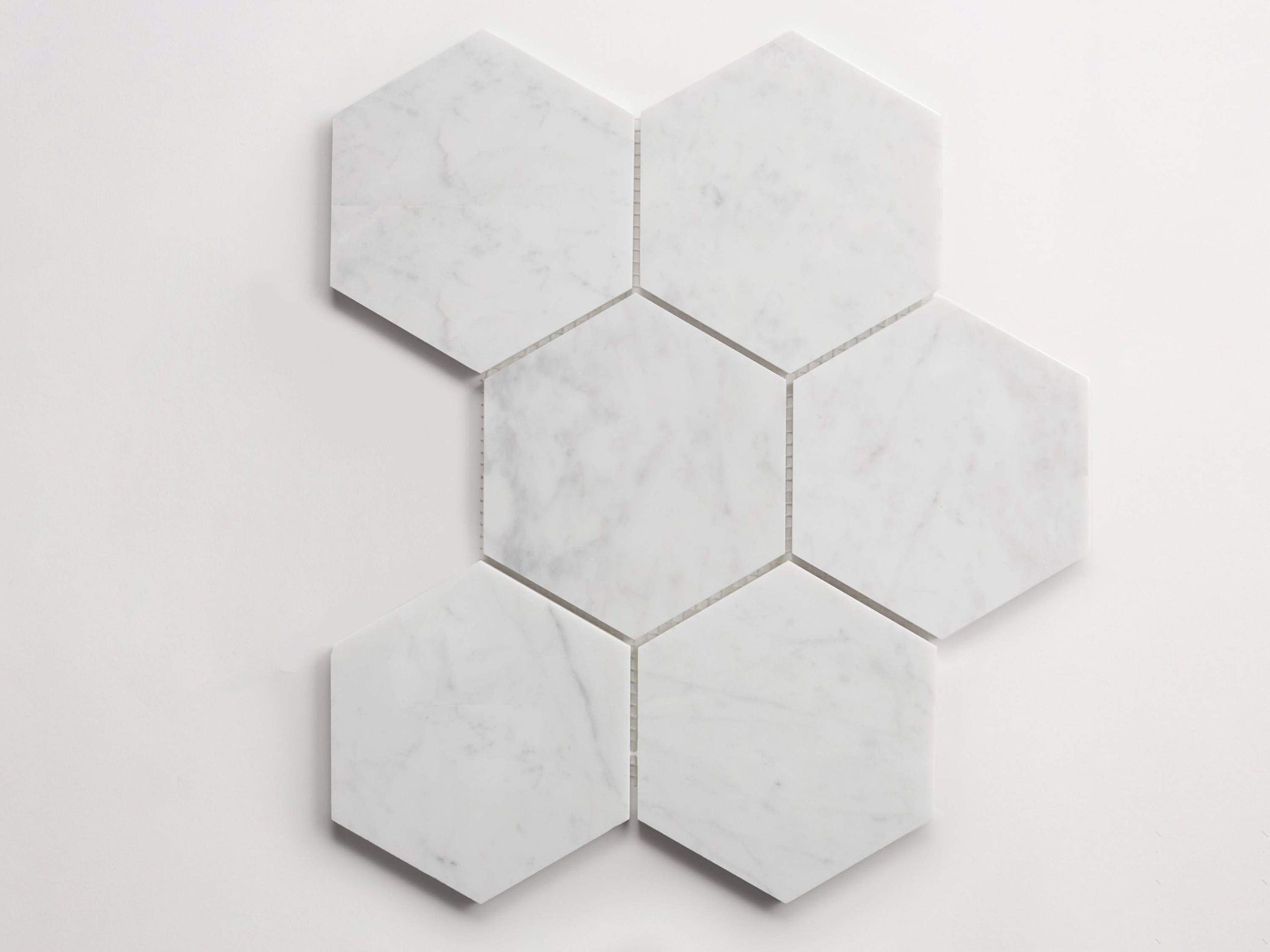 c_l_cle_tile_stone_carrara_hex_sheet_big_main_3000x2250_re.jpg