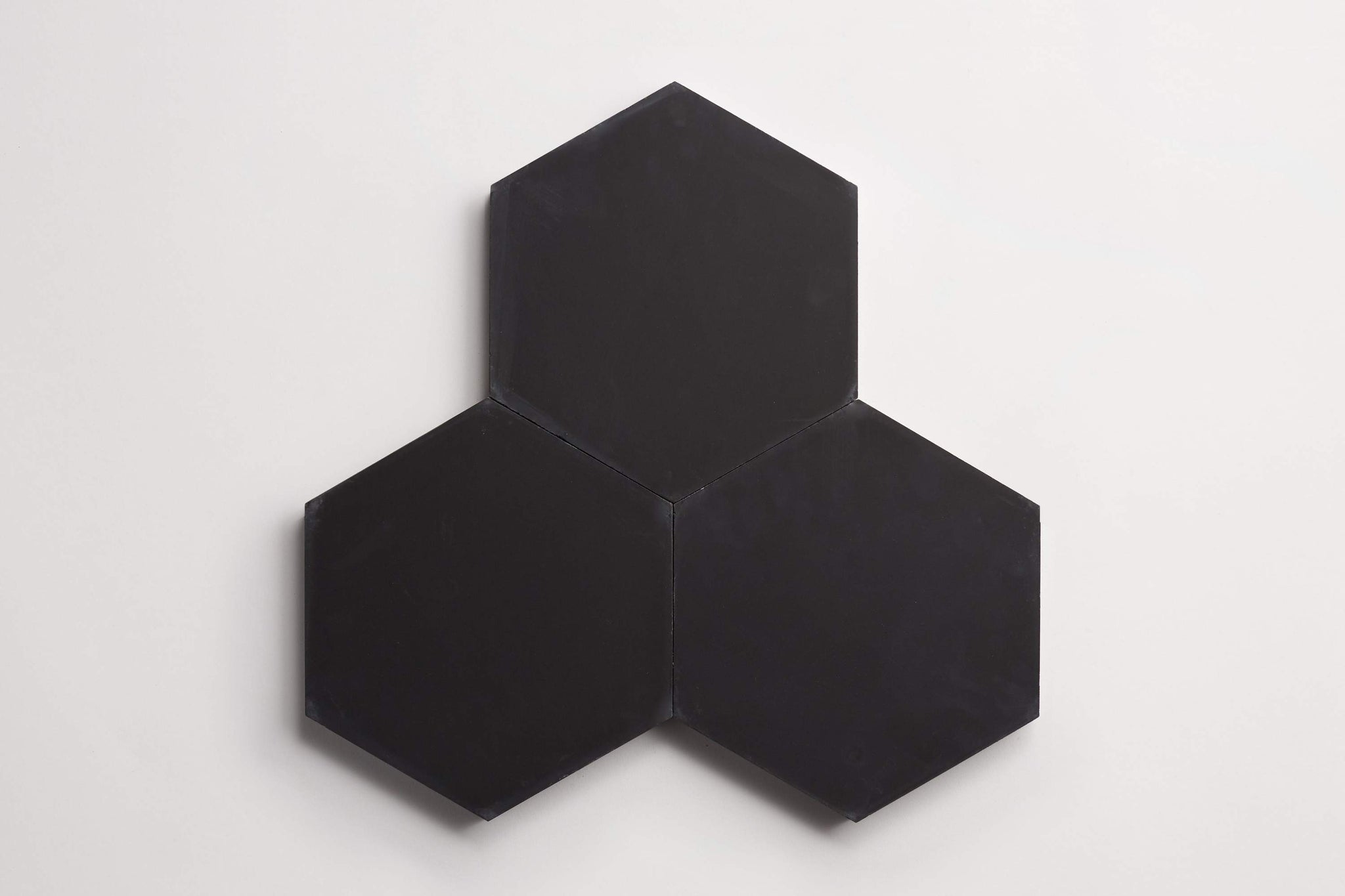 cement | solid | black | hex ~ 9"x8"x0.625"