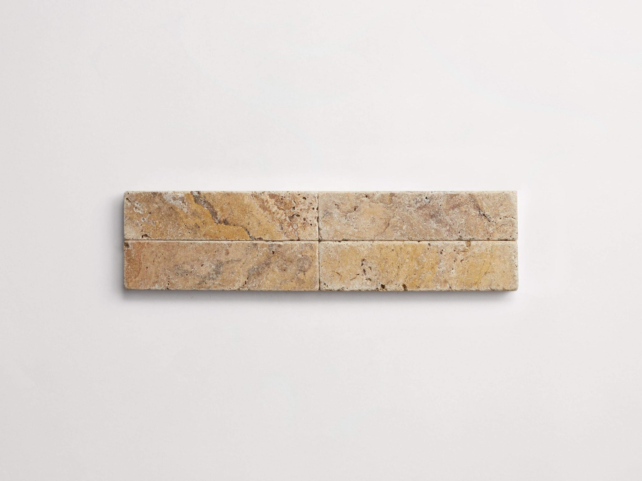 tr1002-pumice-cle-tile-travertine-marble-rectangle-2x8-scabos-4up-3000x2250-1.jpg