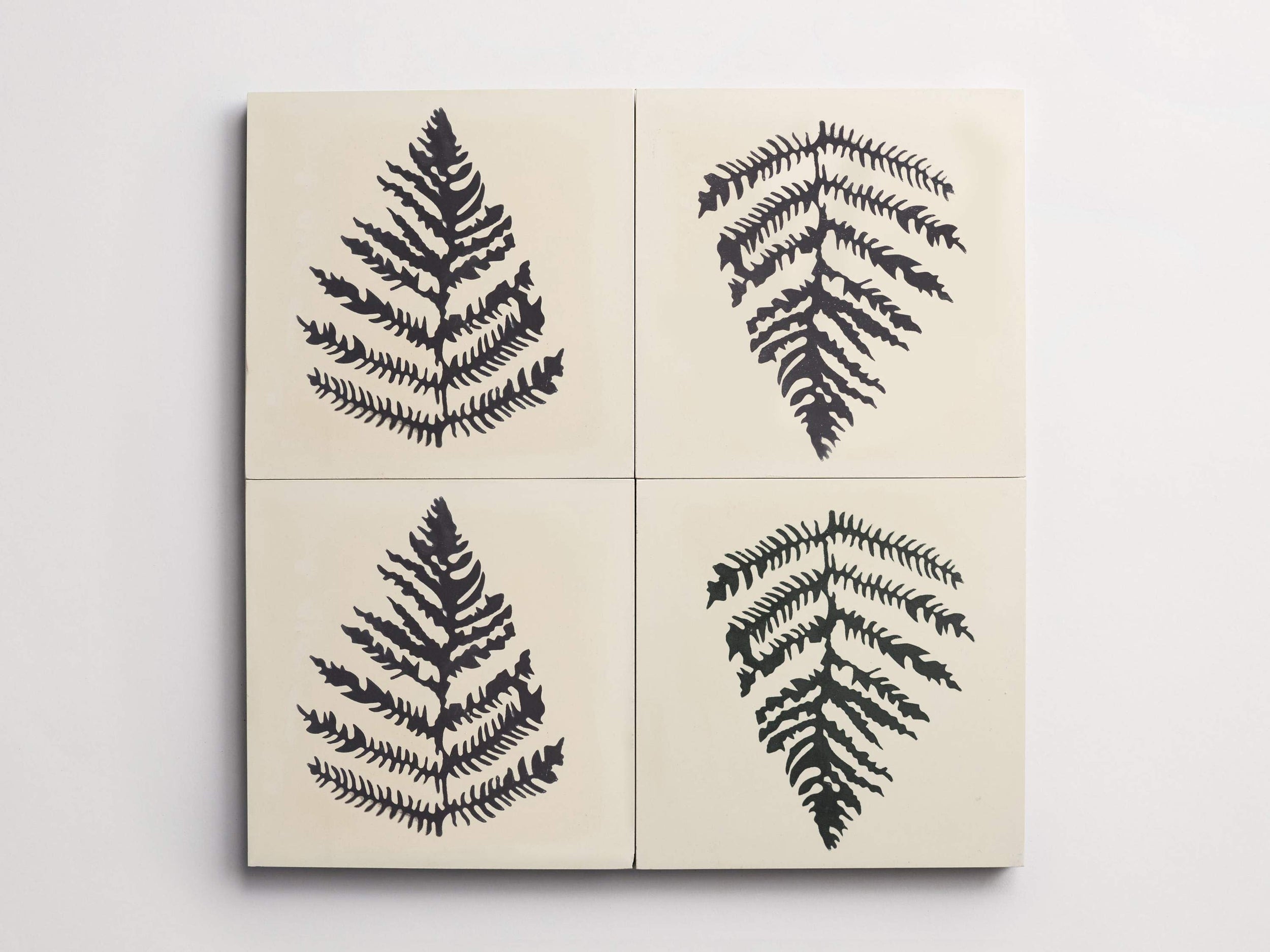 ac10186sf_cle_tile_cement_artist_ericatanov_leaf_plaster_black_4up_3000x2250_2_1_1.jpg