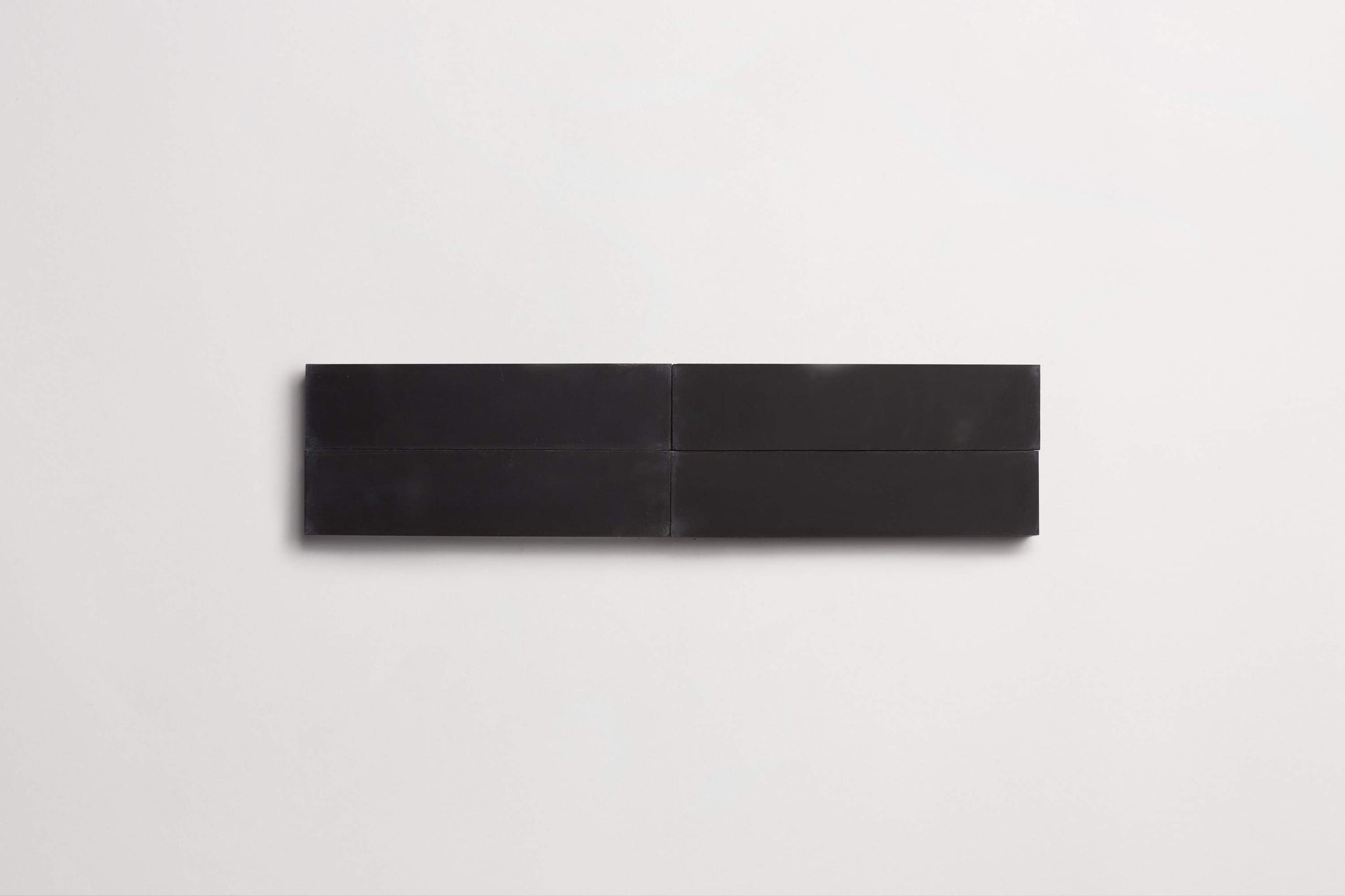 cement | solid | black | rectangle ~ 3"x12"x0.625"