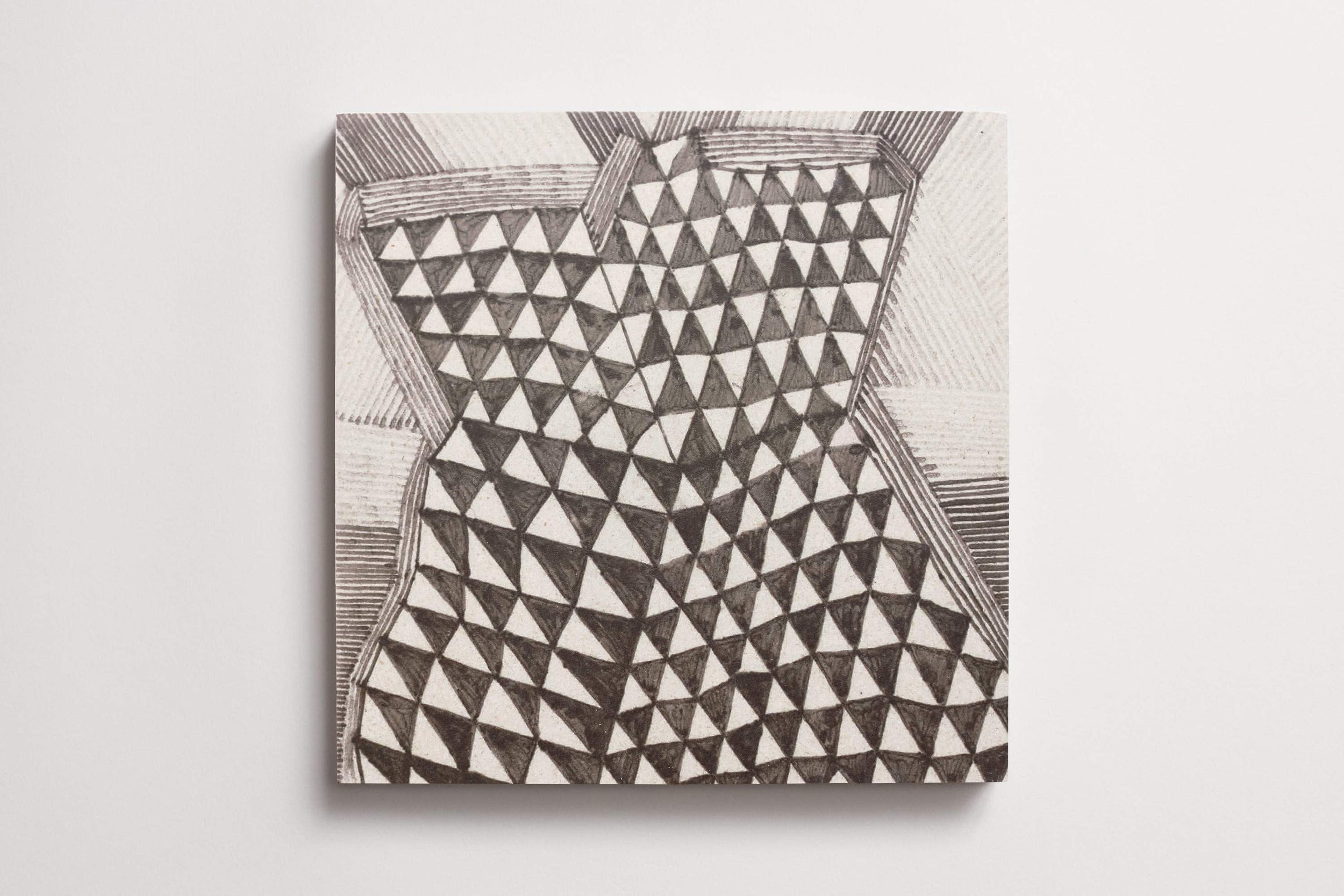 c_l_cle_tile_limestone_ruan_hoffmann_mlm_charcoal_tribal_texture_pks_square_12x12_3.0.jpg