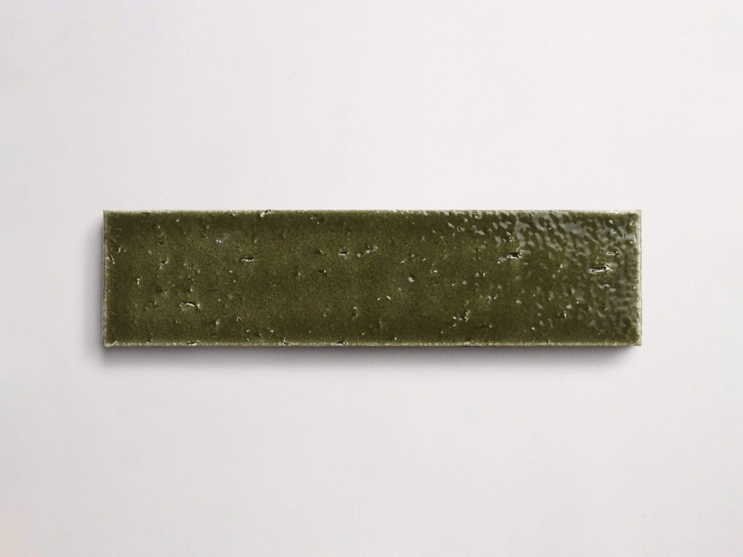 gb12002_cle_tile_mfb_deep_green_gloss_single_2.5x9.5_overhead_main_3000x2250_1.jpg